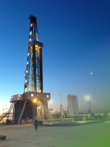 Techdrill drilling rig at dusk